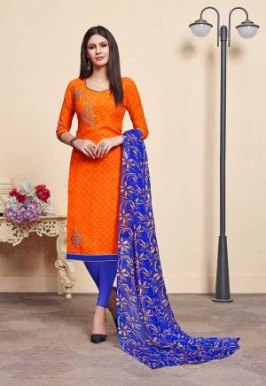 Simple And Elegant Looking Dress Material Is Here In Orange Colored Top Paired With Royal Blue Colored Bottom And Dupatta. Its Top Is Fabricated On Jacquard Silk Paired With Cotton Bottom And Chiffon Fabricated Dupatta. Buy This Pretty Dress Material Now.