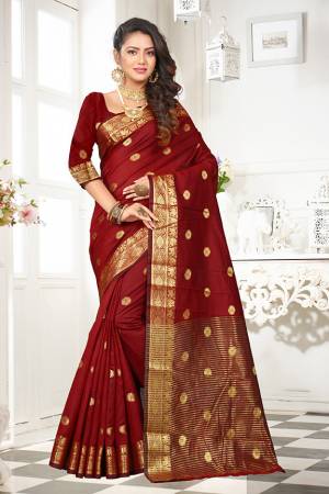 Celebrate This Festive Season With Beauty And Comfort Wearing This Designer Saree In Brown Color Paired With Brown Colored Blouse. This Saree And Blouse Are Fabricated On Art Cotton Silk Beautified With Weave. It Is Light Weight And easy To Drape. 