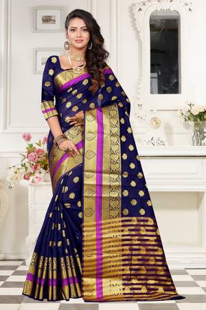 Celebrate This Festive Season With Beauty And Comfort Wearing This Designer Saree In Navy Blue Color Paired With Navy Blue Colored Blouse. This Saree And Blouse Are Fabricated On Art Cotton Silk Beautified With Weave. It Is Light Weight And easy To Drape. 