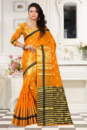 Grab This Designer Rich And Elegant Looking Saree In Musturd Yellow Color Paired With Musturd Yellow Colored Blouse. This Saree And Blouse Are Fabricated On Art Cotton Silk Beautified With Weave Butti And Lace Border. Buy This Saree Now.