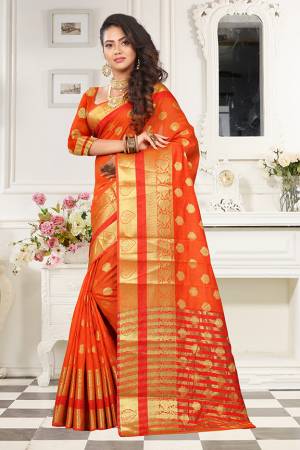 Celebrate This Festive Season With Beauty And Comfort Wearing This Designer Saree In Orange Color Paired With Orange Colored Blouse. This Saree And Blouse Are Fabricated On Art Cotton Silk Beautified With Weave. It Is Light Weight And easy To Drape. 