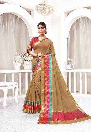 Flaunt Your Rich And Elegant Taste Wearing This Designer Silk based Saree In Beige Color Paired With Red Colored Blouse. This Saree And Blouse Are fabricated On Cotton Silk Beautified With Attractive Weave. 
