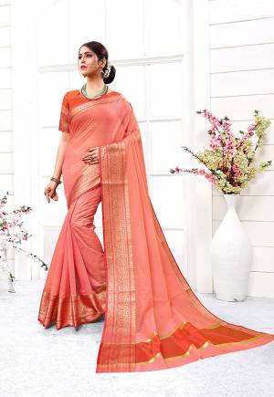 Flaunt Your Rich And Elegant Taste Wearing This Designer Silk based Saree In Pink Color Paired With Orange Colored Blouse. This Saree And Blouse Are fabricated On Cotton Silk Beautified With Attractive Weave. 
