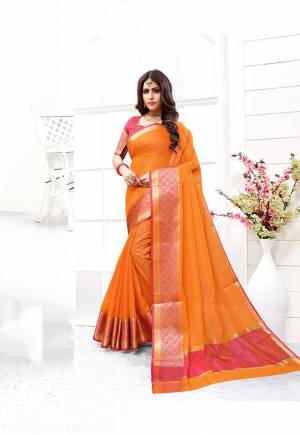 Adorn the Pretty Angelic Look In This Designer Silk Based Saree In Orange Color. This Saree And Blouse Are Fabricated On Cotton Silk Beautified With Weave Giving The Saree An Attractive Look.