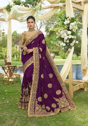 Catch All The Limelight Wearing This Heavy Designer Saree In Purple Color Paired With Beige Colored Blouse. This Saree Is Fabricated On Soft Silk Paired With Art Silk Fabricated Blouse. Also It Has Heavy Jari Embroidery Which Is Complimennting The Dark Color Tone. Buy Now.