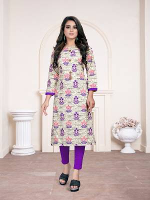 Simple Kurti Is Here For Your Casual Wear In White And Purple Color Fabricated On Cotton. It Is Beautified With Prints and Available In All Regular Sizes. 