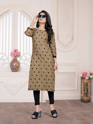 Rich And Elegant Looking Readymade Kurti IS Here In Beige Color Fabricated On Cotton. It Is Beautified With Pretty simple Prints All Over It.