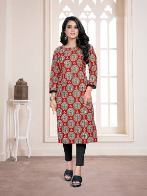 Be It Your College, Home Or Work Place, This Kurti IS Suitable For All. Grab This Readymade Kurti In Red And Black Color Fabricated On Cotton Beautified With Prints All Over. 