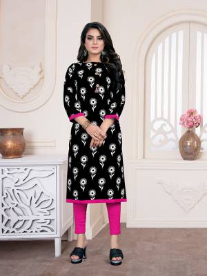 Add Some Casuals With This Readymade Straight Kurti In Black Color Fabricated On Cotton Beautified With All Over Prints 