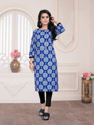 Simple Kurti Is Here For Your Casual Wear In Blue Color Fabricated On Cotton. It Is Beautified With Prints and Available In All Regular Sizes. 
