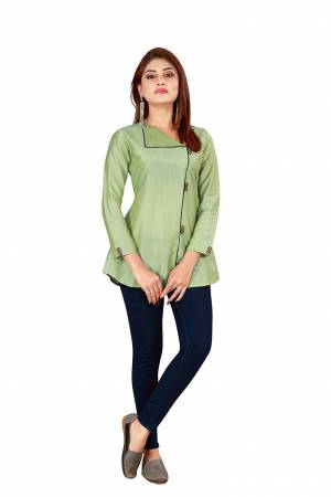 Grab This Pretty Simple Readymade Top In Pastel Green Color Fabricated On Art Silk. You Can Pair This Up With Denim Or Pants. Buy Now.