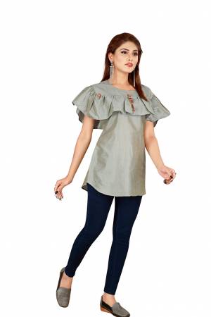 Rich And Elegant Looking Readymade Top Is Here In Grey Color Fabricated On Art Silk. This Pretty Top Looks Best With Blue Or Black Colored Denim. Buy Now.