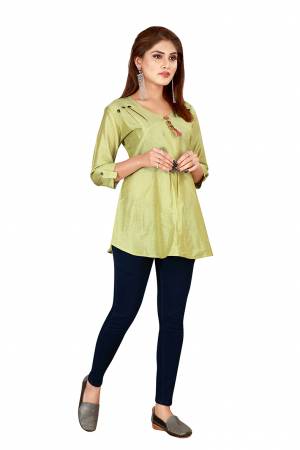 Grab This Pretty Simple Readymade Top In Pear Green Color Fabricated On Art Silk. You Can Pair This Up With Denim Or Pants. Buy Now.