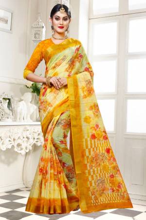 Simple Saree Is Here For Your Casual Wear In Light Yellow Color Paired With Musturd Yellow Colored Blouse. This Saree And Blouse are Fabricated On Cotton Silk Beautified With Floral Prints All Over. 