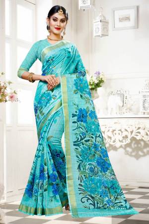 Simple Saree Is Here For Your Casual Wear In Light Blue Color Paired With Light Blue Colored Blouse. This Saree And Blouse are Fabricated On Cotton Silk Beautified With Floral Prints All Over. 