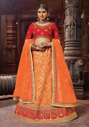 Shine Bright In This Designer Lehenga Choli With Proper Ethnic Color Pallete. Grab This Heavy Designer Lehenga Choli In Red And Orange Color. This Silk bAsed Lehenga Choli Is Paired With Net Fabricated Dupatta. Also It Is Light In Weight And Easy To Carry Throughout The Gala.