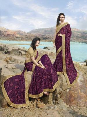 A Must Have Shade In Every Womens Wardrobe Is Here With This Heavy Designer Saree In Purple Color Paired With beige Colored Blouse. This Saree Is Georgette Based Paired With Art Silk Fabrricated Blouse. It Is Beautified With Contrasting Thread Work Giving A Subtle Look To The Saree. 