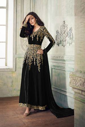 Add This Beautiful Designer To Your Wardrobe In Black Color Paired With Black Colored Bottom And Dupatta. Its Beautiful Embroidered Top Is Fabricated On Georgette Paired With Santoon Bottom And Chiffon Fabricated Dupatta. Its Rich Embroidery Pattern Is Giving The Suit An Attractive Look. 
