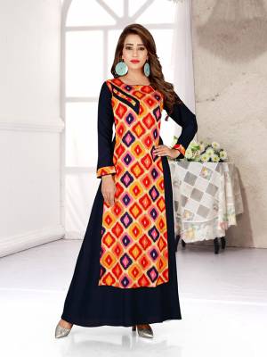 Go Colorful With This Readymade Gown In Multi And Blue Color Fabricated Rayon. This Gown Is Beautified With Prints All Over And Has A Trendy Double Layer Pattern. Buy Now.