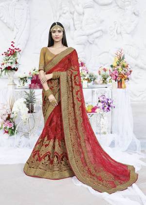 Adorn The Pretty Angelic Look Wearing This Heavy Designer Saree In Red Color Paired With Beige Colored Blouse. This Heavy Embroidered Saree Is Net Based Paired With Art Silk Fabricated Blouse. Buy Now.