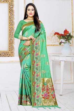 Here Is A Beautiful Saree To Add Into Your Wardrobe For The Upcoming Festive Season. Grab This Sea Green Colored Saree Paired With Sea Green Colored Blouse. This Saree And Blouse Are Fabricated On Art Silk Beautified With Weave. 