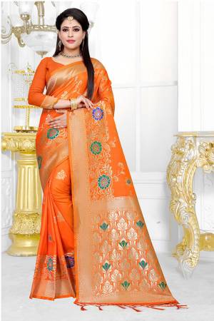 Celebrate This Festive Season Wearing This Designer Silk Based Saree In Orange Color Paired With Orange Colored Blouse, This Saree And Blouse Are Fabricated On Art Silk Beautified With Weave. Buy This Saree Now.