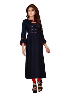 Grab This Readymade Pretty Kurti In Navy Blue Color Fabricated On Rayon. It Is Light In Weight And Can Be Paired With Same Or Contrasting  Colored Leggings Or Pants. 
