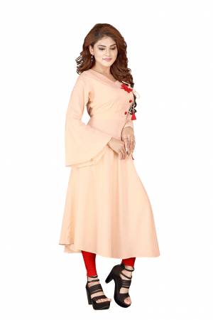 Look Pretty In This Designer Readymade Straight Kurti In Peach Color Fabricated on Rayon. It Is Light In Weight And Easy To Carry All Day Long. 