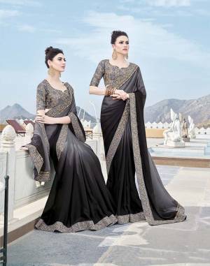Flaunt Your Rich And Elegant Taste Wearing This Designer Shaded Saree In Grey And Black Color Paired With Grey Colored Blouse. This Saree Is Fabricated on Silk Georgette paired With Art Silk Fabricated Blouse. 