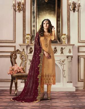 Get Ready For The Upcoming Festive And Wedding Season With This Heavy designer Straight Suit In Orange Color Paired With Contrasting Maroon Colored Dupatta. Its Top Is Fabricated On Satin Georgette Paired With Santoon Bottom And Georgette Fabricated Dupatta. Its Attractive Color Combination And Embroidery Gives A Pretty Highlight To The Suit. Buy Now.