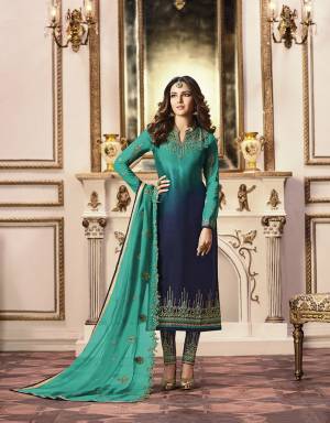 Go with The Pretty Shades Of Blue With This Heavy Designer Shaded Suit In Blue And Navy Blue Colored Top Paired With Navy Blue Colored Bottom And Blue Colored Dupatta. Its Top Is Fabricated On Satin Georgette Paired With Santoon Bottom And Georgette Fabricated Dupatta. All Three Piece Are Beautified With Heavy Attractive Embroidery Work.