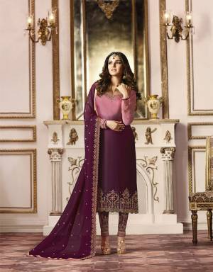 Look Pretty In These Pretty Girly Shades With This Designer Straight Suit In Shaded Pink And Wine Colored Top Paired With Wine Colored Bottom And Dupatta. Its Top Is Fabricated On Satin Georgette Paired With Santoon Bottom And Georgette Fabricated Dupatta. 