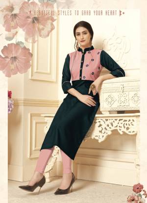 Here Is Very Pretty Yoke Patterned Readymade Straight Kurti In Dark Blue Color Fabricated On Cotton Slub Beautified With Thread Work. 