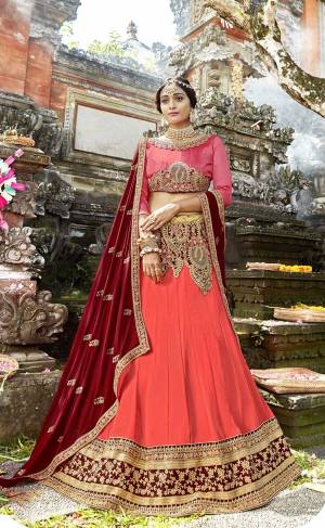 Catch All Thr Limelight At The Next Wedding You Attend Wearing This Heavy Designer Lehenga Choli In Crimson Red Color Paired With Maroon Colored Dupatta. Its Blouse Is Fabricated On Art Silk Paired With Georgette Lehenga And Chiffon Fabricated Dupatta. Buy Now.