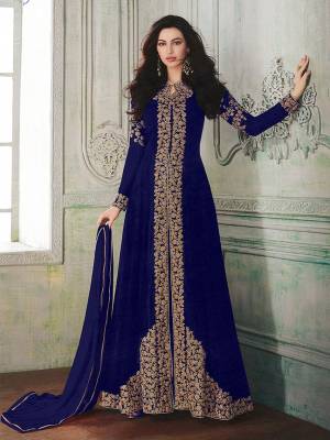 Look beautiful in this Royal Blue Colored georgette front slit flair suit with embroidered floral patterns on the Top. Comes with matching Santoon bottom and Chiffon dupatta. Buy Now.