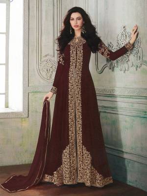 Look beautiful in this Brown Colored georgette front slit flair suit with embroidered floral patterns on the Top. Comes with matching Santoon bottom and Chiffon dupatta. Buy Now.