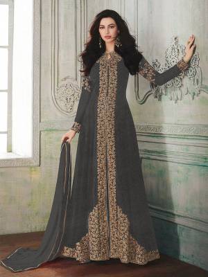 Look beautiful in this Grey Colored georgette front slit flair suit with embroidered floral patterns on the Top. Comes with matching Santoon bottom and Chiffon dupatta. Buy Now.