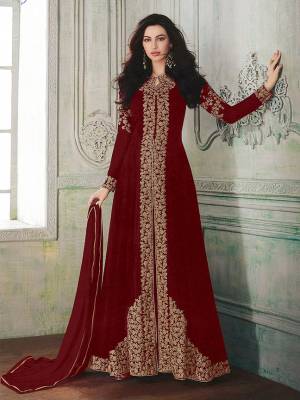 Look beautiful in this Maroon Colored georgette front slit flair suit with embroidered floral patterns on the Top. Comes with matching Santoon bottom and Chiffon dupatta. Buy Now.