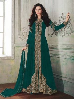 Look beautiful in this Sea Green Colored georgette front slit flair suit with embroidered floral patterns on the Top. Comes with matching Santoon bottom and Chiffon dupatta. Buy Now.