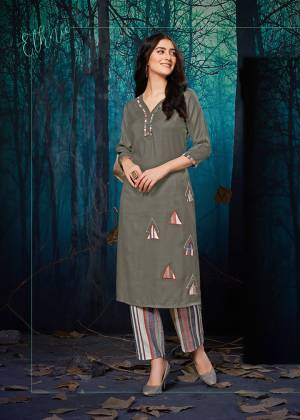 Flaunt Your Rich And Elegant Taste Wearing This Designer Readymade Pair Of Kurti And Plazzo In Grey Colored Top Paired With Multi Colored Lining Plazzo. Its Top IS Fabricated On Rayon Paired With Khadi Cotton Bottom. This Kurti Is Beautified With Applique Work With The Bottom Fabric. 