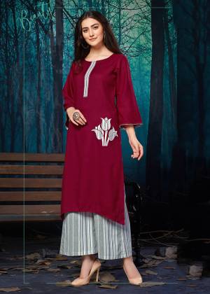 Simple and elegant Looking Readymade Plazzo Set Is Here In Maroon Colored Kurti Paired With Grey Colored Lining Plazzo. Its Top IS Fabricated on Rayon Beautified With Applique Work Paired With Khadi Cotton Fabricated Plazzo. 