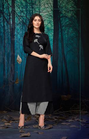 For A Bold And Beautiful Look, Grab This Readymade pair Or plazzo And Kurti In Black And White Color. Its Top IS Rayon Based Paired With Khadi Cotton Fabricated Plazzo. Buy This Pretty Pair Now.