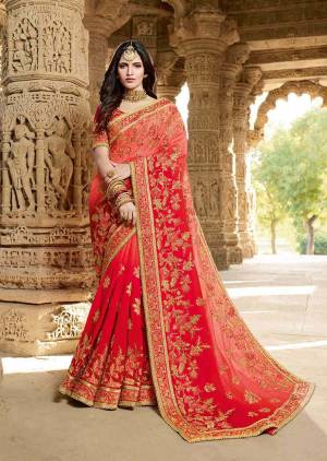 Adorn The Pretty Angelic Look Wearing This Heavy Designer Shaded Saree In Pink And Red Color Paired With Red Colored Blouse. This Saree Is Silk Georgette Based Paired With Art Silk Fabricated Blouse. 