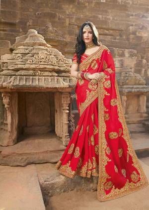Adorn The Pretty Angelic Look Wearing This Heavy Designer Shaded Saree In Crimson Red Color Paired With Crimson Red Colored Blouse. This Saree Is Silk Georgette Based Paired With Art Silk Fabricated Blouse. 