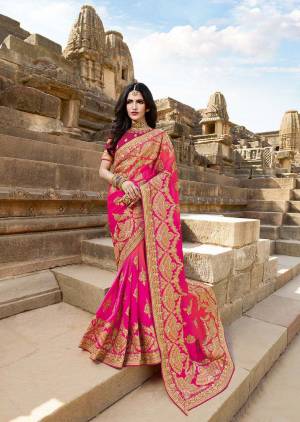 Shades Of Pink Gives A Pretty Look To Everyone, So Grab This Very Beautiful Heavy Designer Saree In Rani Pink Color Paired With Magenta Pink Colored Blouse. This Saree Is Fabricated On Satin Silk Paired With Art Silk Fabricated Blouse. 