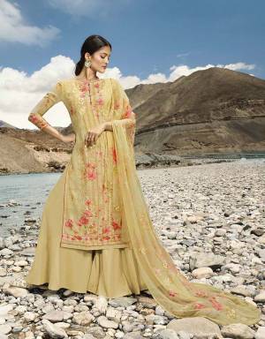 New And Unique Shade Is Here To Add Into Your Wardrobe With This Designer Straight Suit In Occur Yellow Color. Its Top And Dupatta Are Georgette Based With Floral Digital Prints Paired With Santoon bottom. Also Its Top Is Beautified With Attractive Resham And Jari Work.