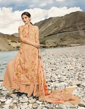 A Must Have Shade In Every Womens Wardrobe Is Here With This Designer Straight Suit In Peach Color Paired With Peach Colored Bottom And Dupatta. Its Top And Dupatta Are Georgette Based Paired With Santoon Bottom and Inner. It Is Beautified With Digital Prints And Embroidery. 