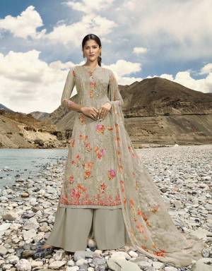 Simple And Elegant Looking Designer Straight Suit Is Here In All Over Grey Color. Its Top And Dupatta Are Georgette Based Beautified With Digital Prints And Embroidery Paired With Santoon Fabricated Bottom. 