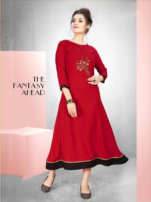 Grab This Beautiful Long Kurti For Your Semi-Casuals In Red Color. This Readymade Kurti Is Fabricated On Rayon Beautified With Butta Work. Also It IS Available In All Regular Sies. 