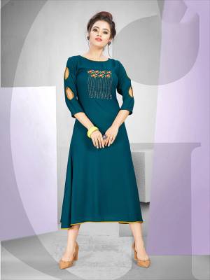 Enhance Your Personality Wearing This Designer Readymade Kurti In Blue Color Fabricated On Rayon. It Is Beautified With Work Making It More Attractive. 